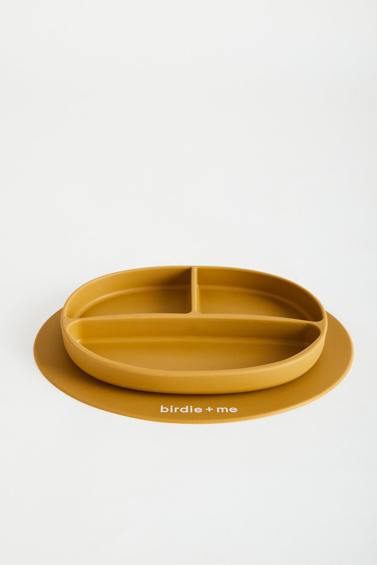 Silicone suction plate in clay. Featuring dividers and birdie + me logo.