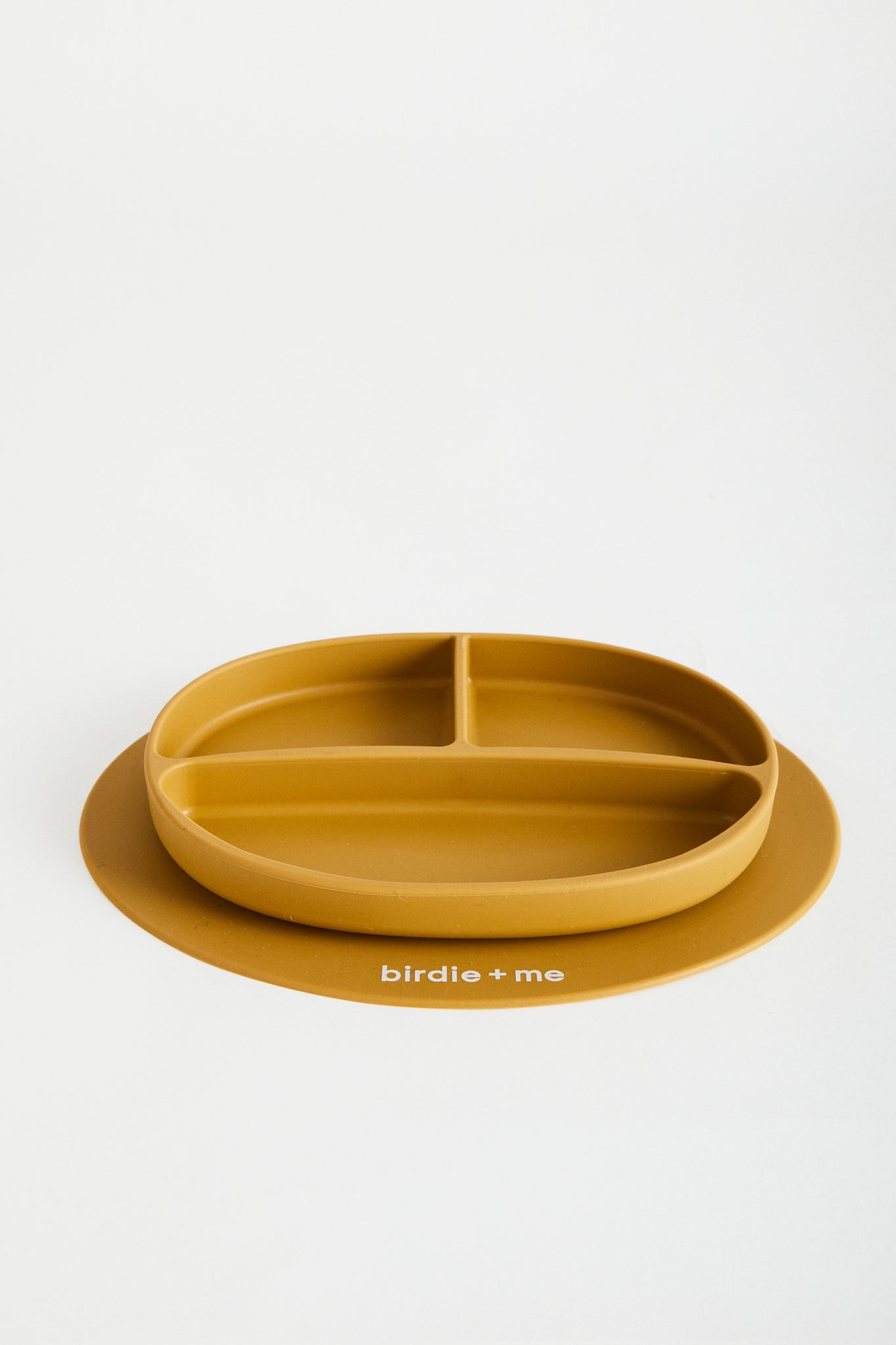 Silicone suction plate in clay. Featuring dividers and birdie + me logo.