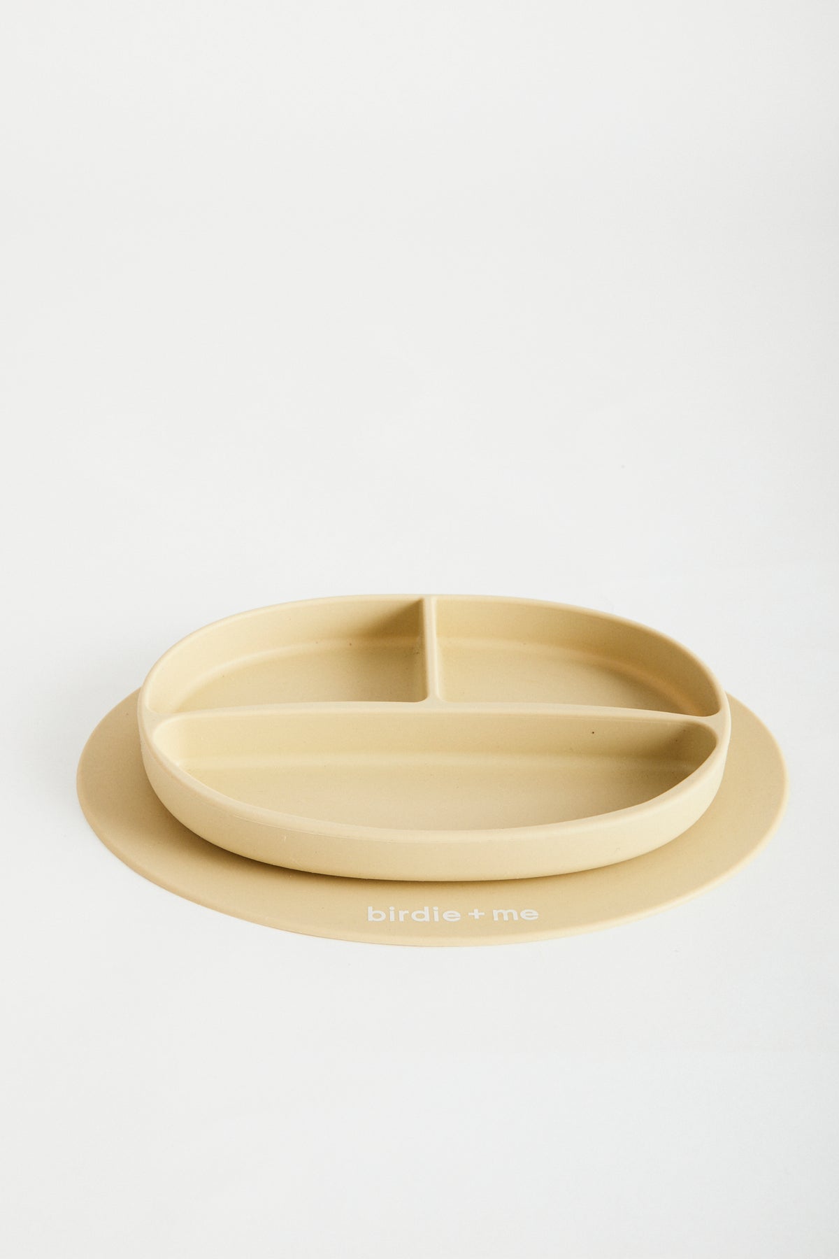 Silicone suction plate in honey. Featuring dividers and birdie + me logo.