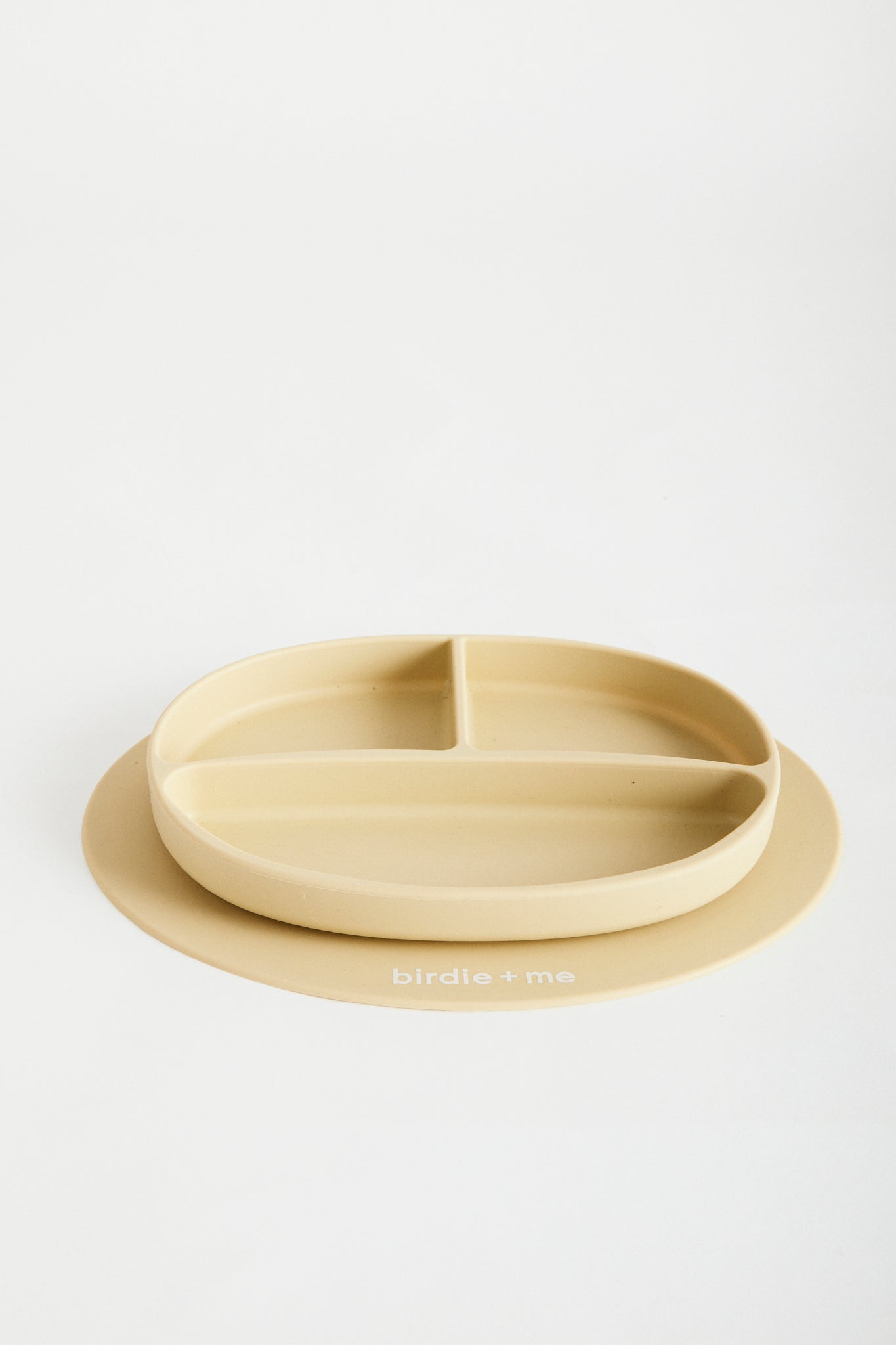 Silicone suction plate in honey. Featuring dividers and birdie + me logo.