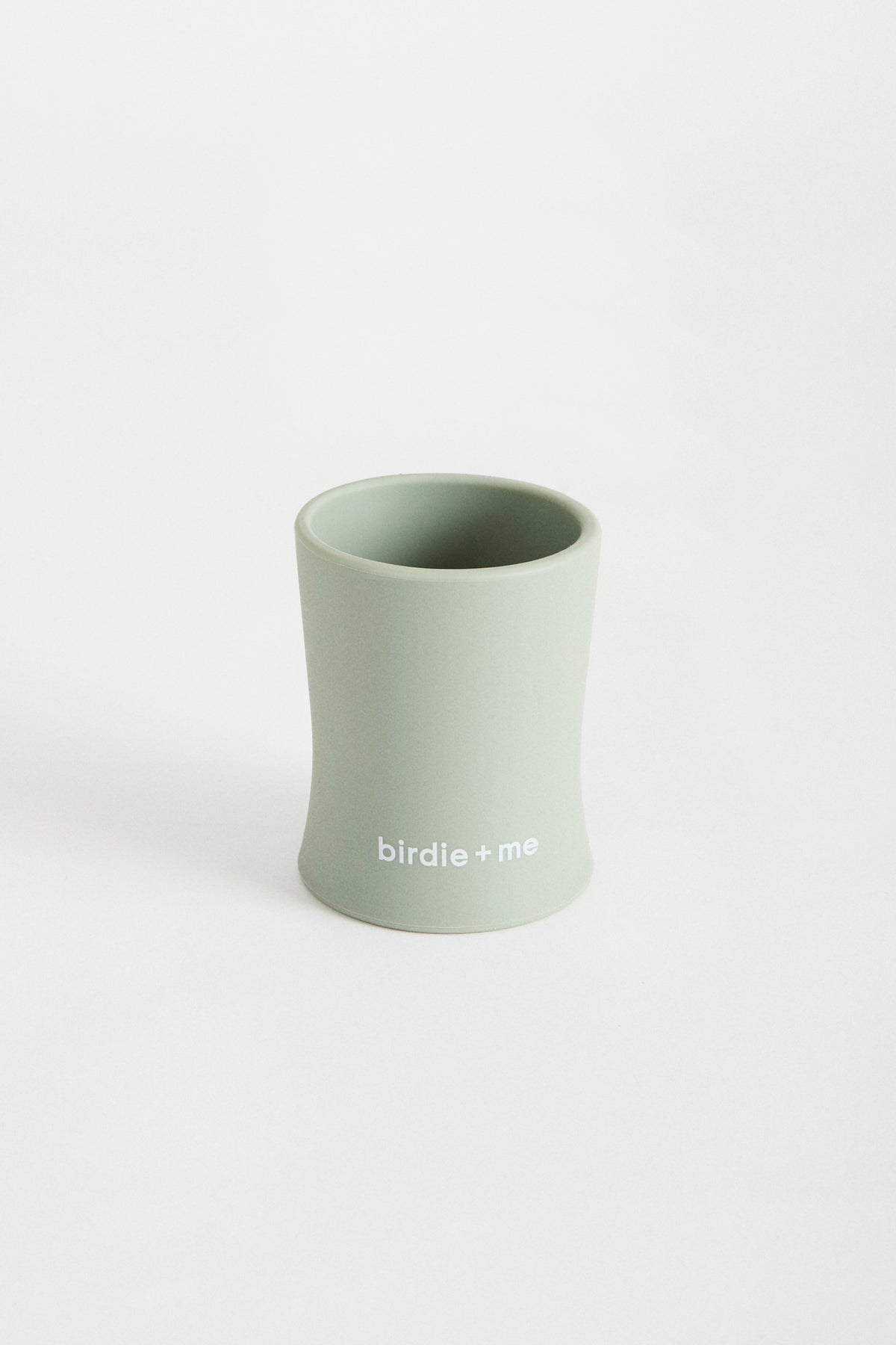 Silicone cup in Teal, birdie + me logo along bottom.