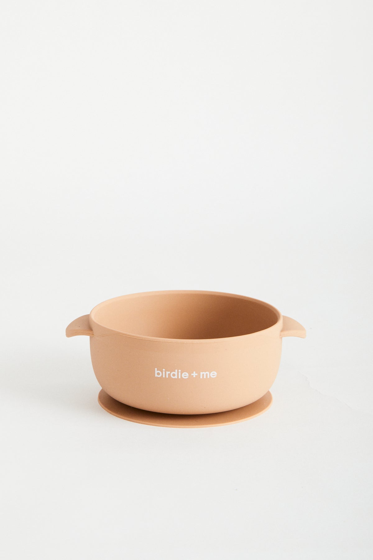 Silicone bowl with suction bottom and lid. Branded with birdie + me logo.