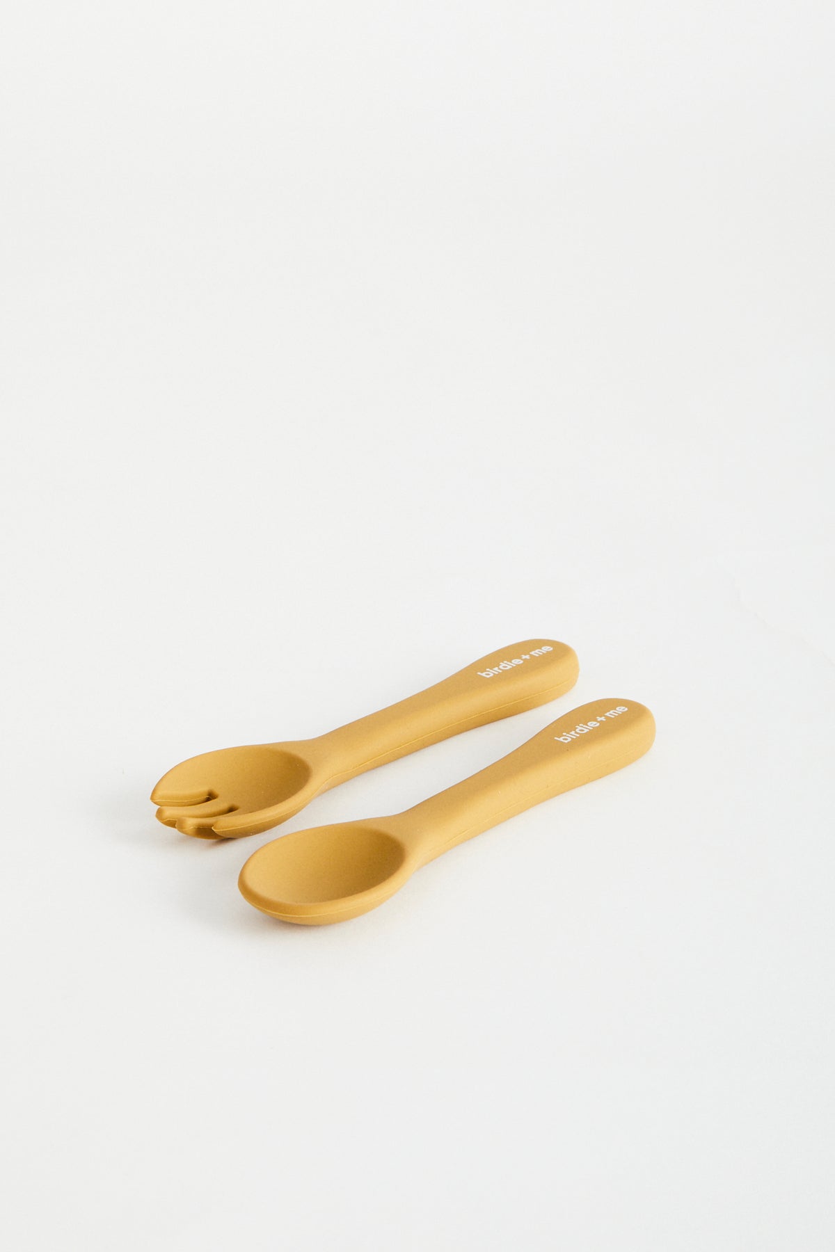 Silicon spoon &amp; fork set in Clay, birdie + me logo on handle.