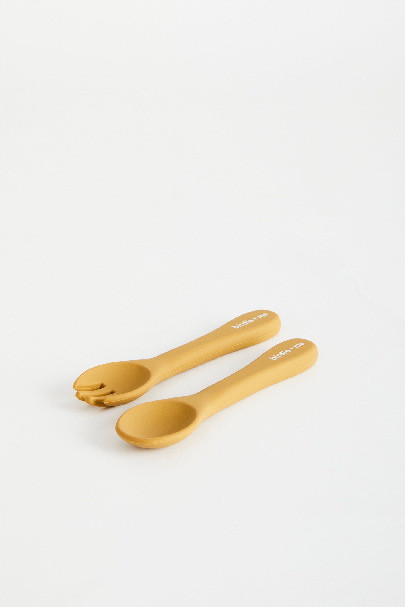 Silicon spoon & fork set in Clay, birdie + me logo on handle.