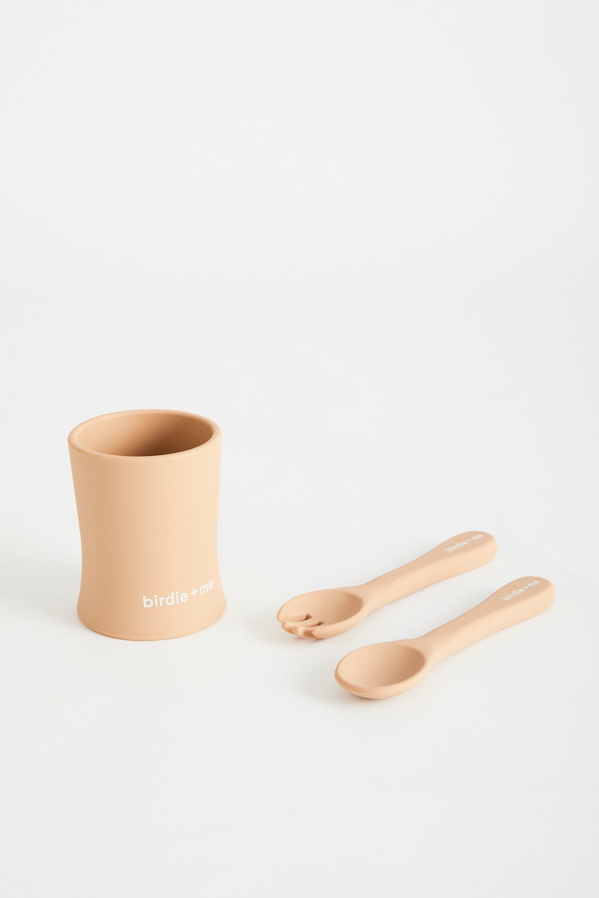 Silicone cup in blush, birdie + me logo along bottom. Teamed with silicone cutlery set.