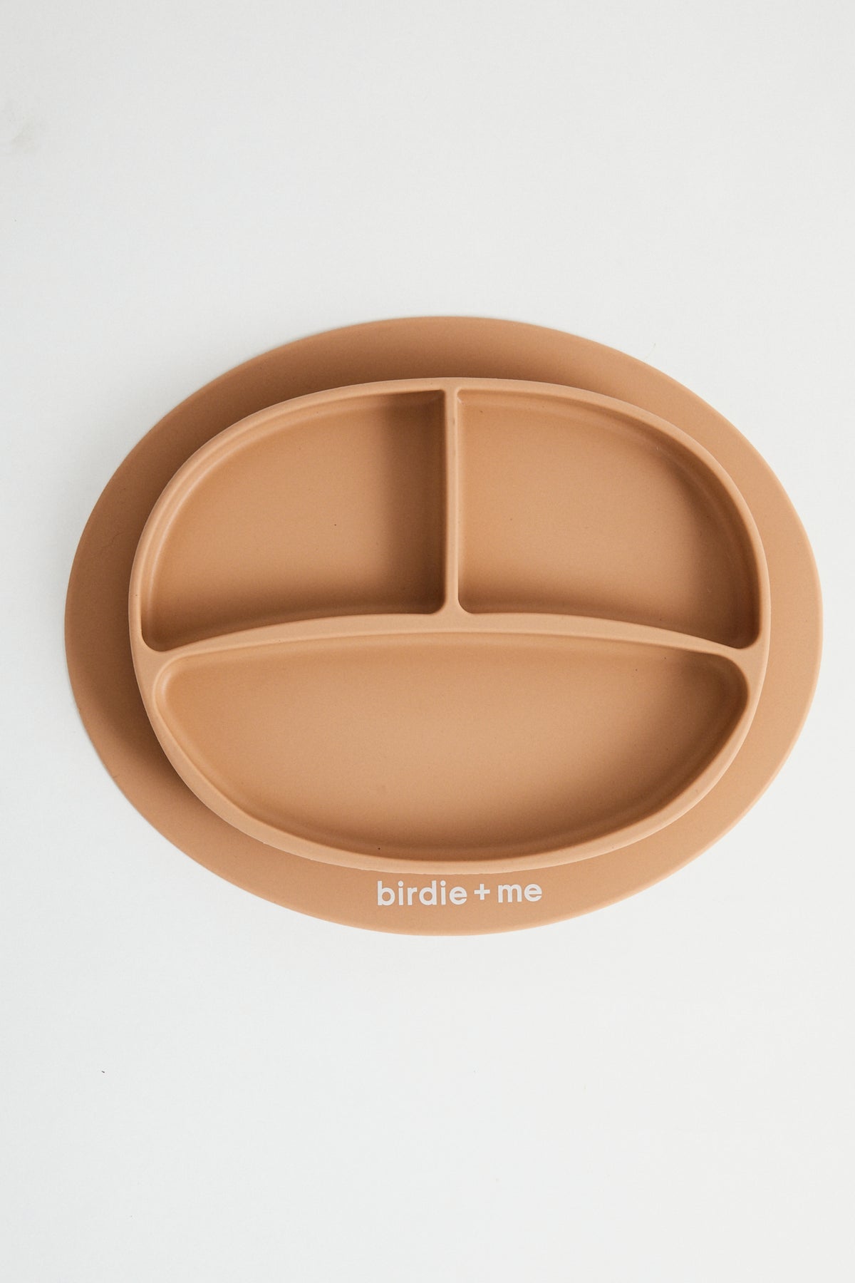 Silicone suction plate in blush. Featuring dividers and birdie + me logo.
