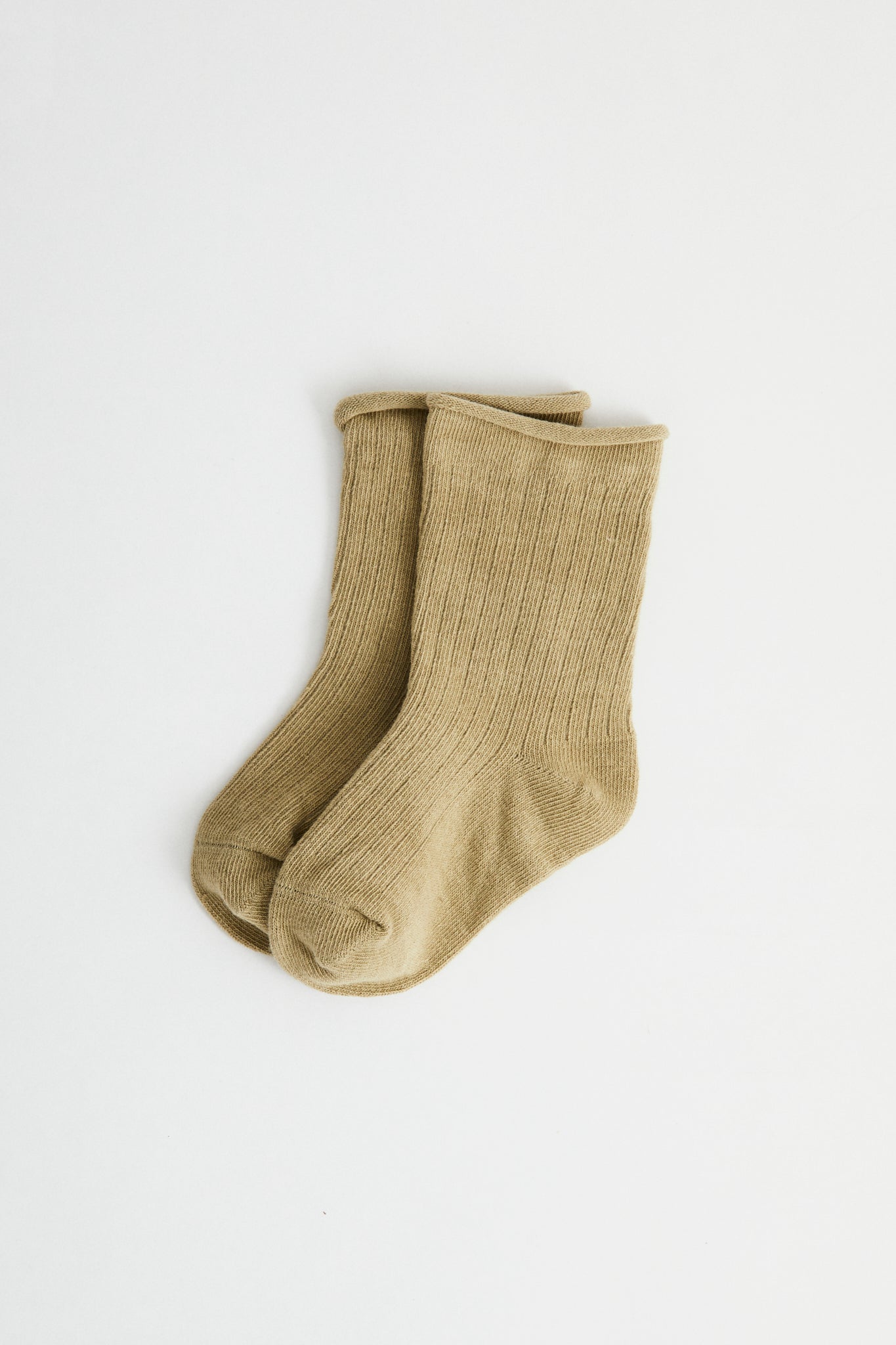 Sage coloured ribbed socks, rolled hem.