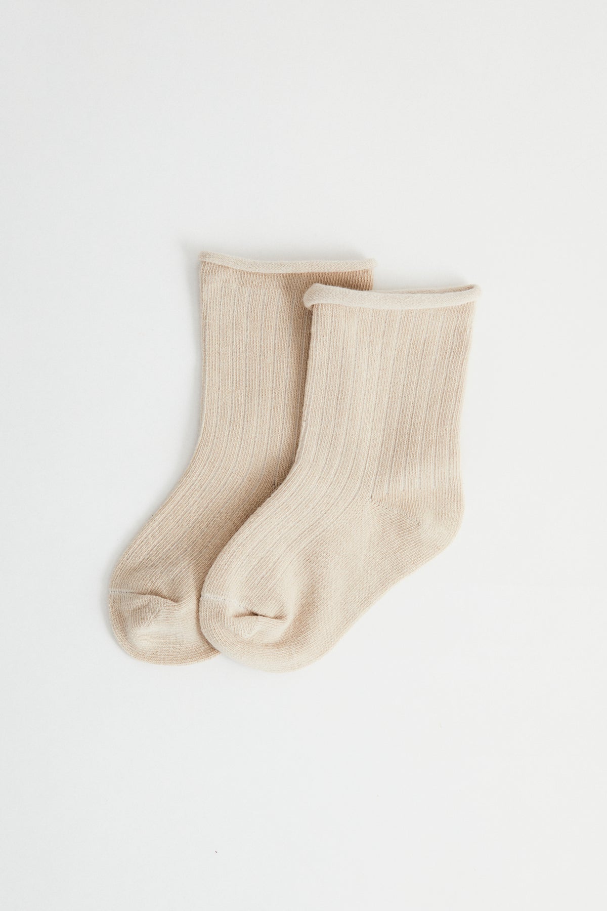 Oat coloured ribbed socks, rolled hem.