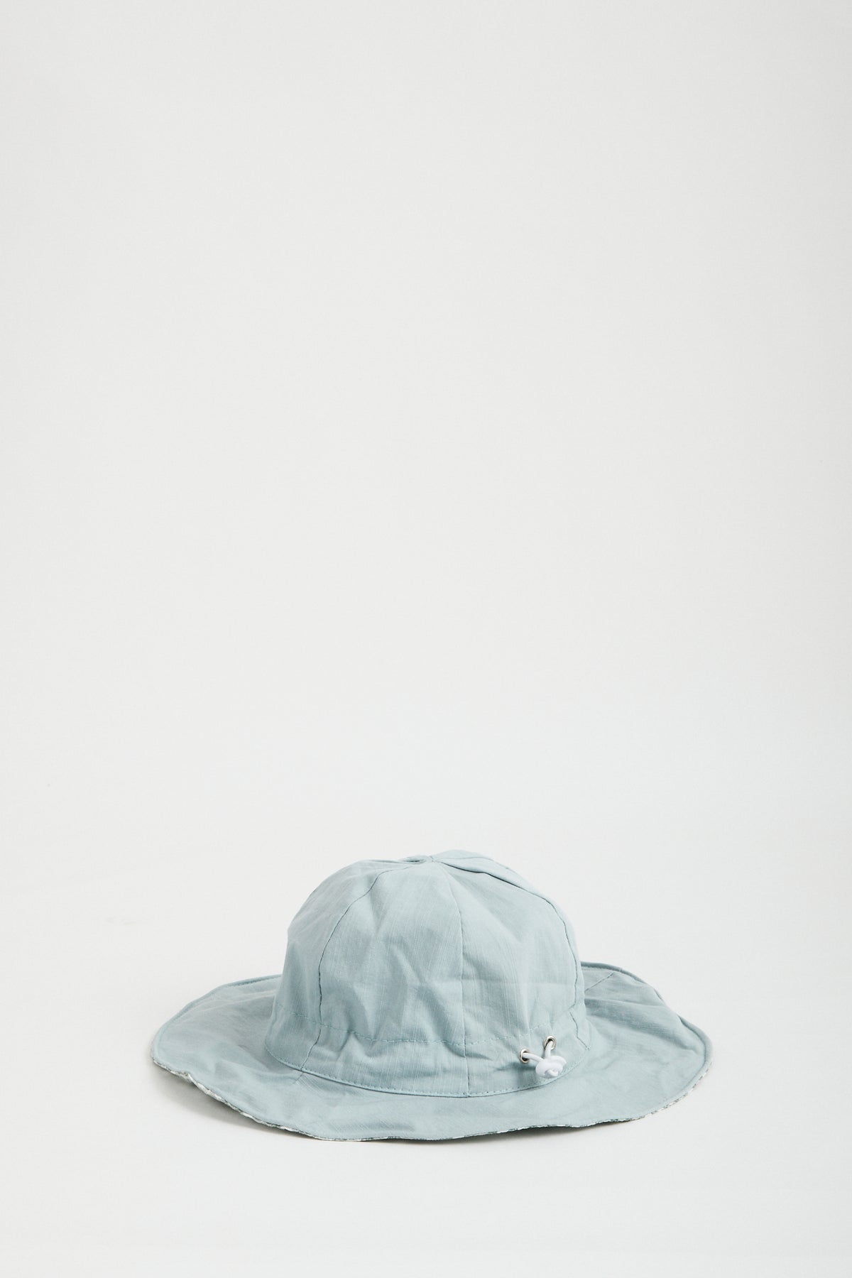 Blue Gingham reversible sun hat. Drawstring toggle and wire brim.