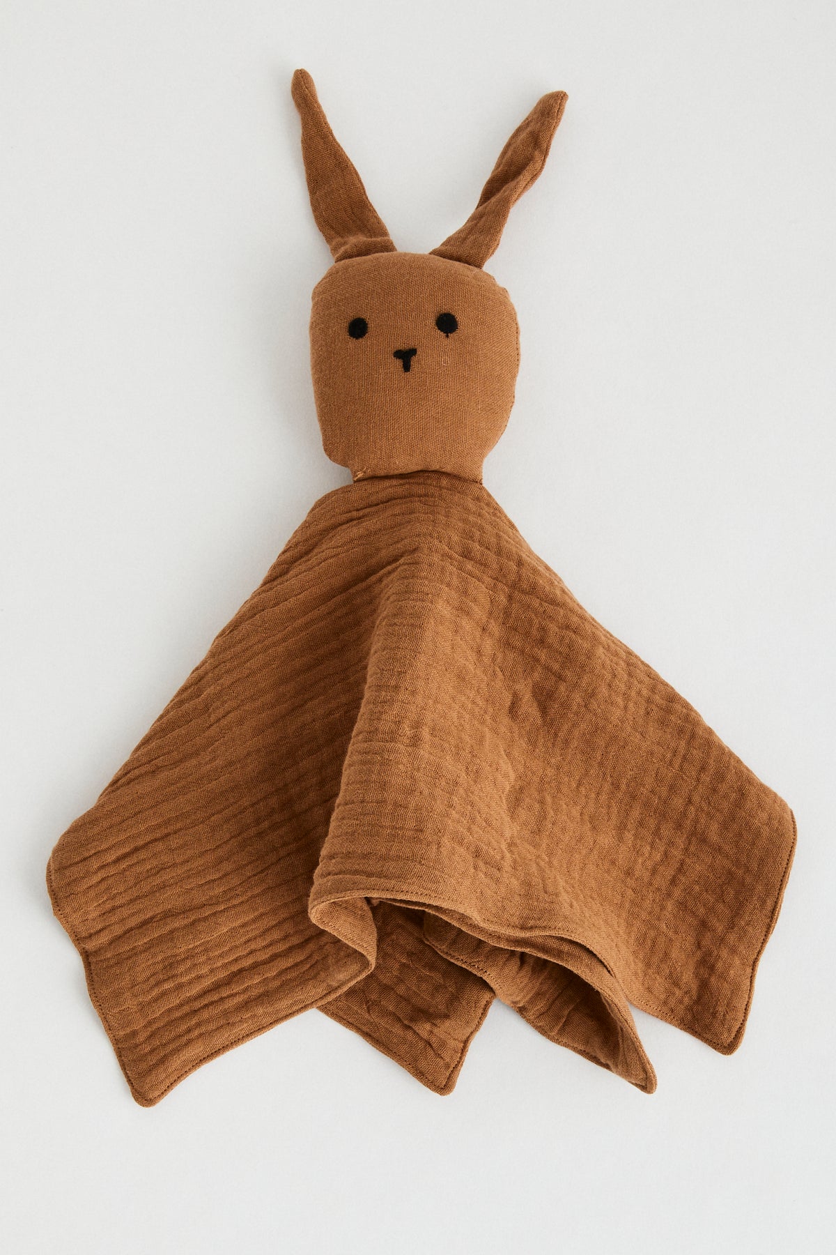 Chocolate organic muslin lovey with bunny head and floppy ears.