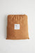 Clay linen drawstring bag. Milky Designs logo on front