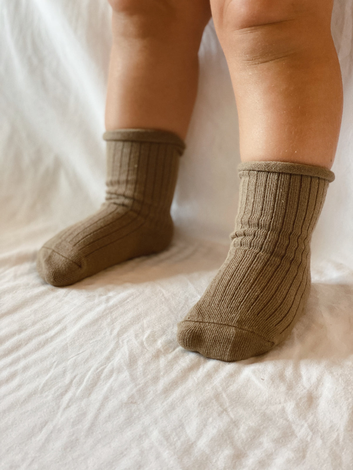 Cocoa coloured ribbed socks, rolled hem.